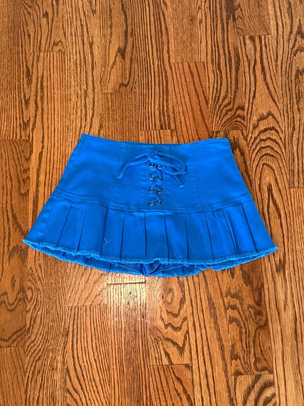 Bright Blue Pleated Mini Skirt with Lace-Up Front